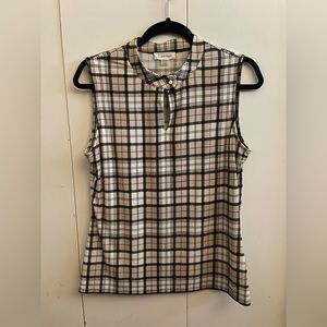 Calvin Klein sleeveless women’s blouse. Tan, cream and black striping. Size M.